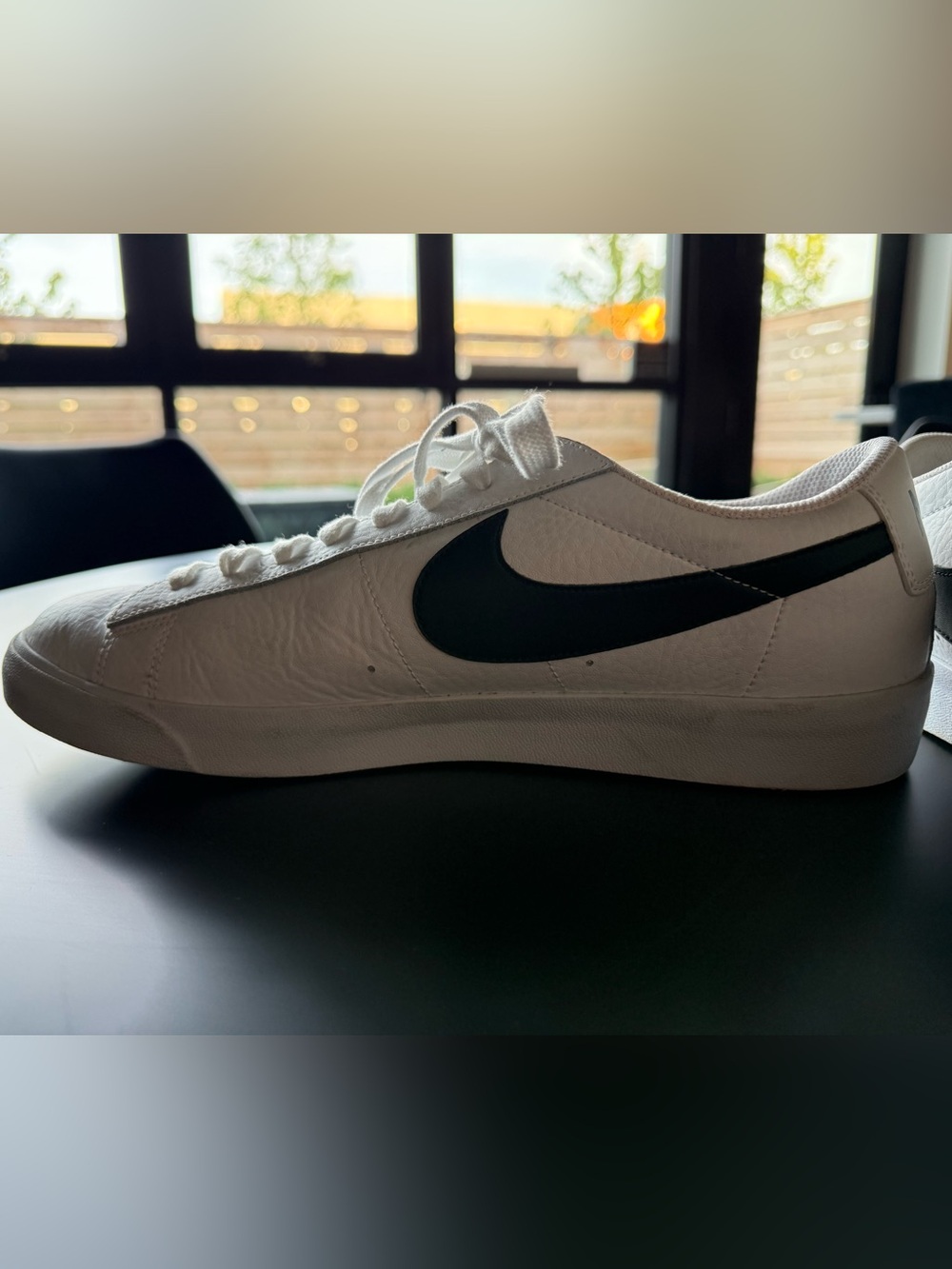 Nike Men’s White Sneaker with Black Swoosh - Size 11